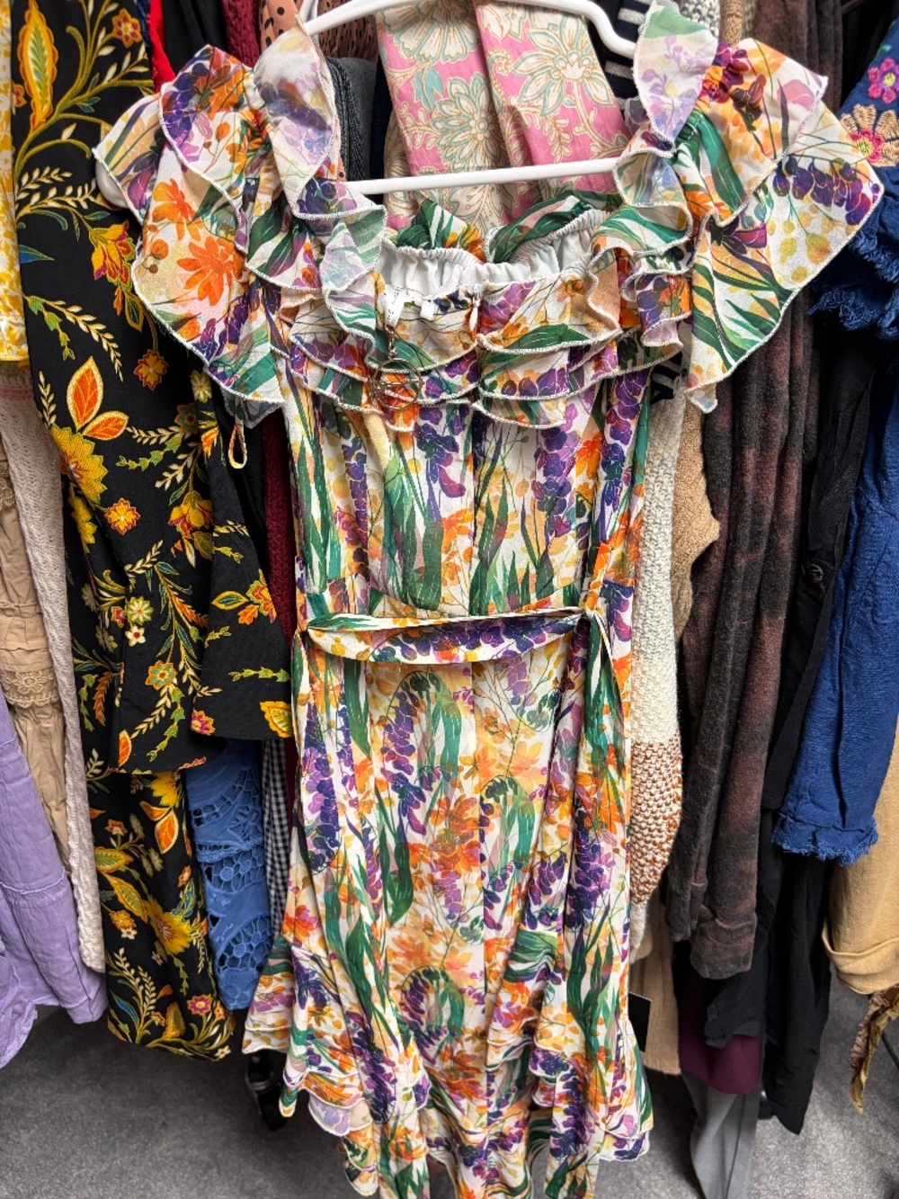 A loud Floral off the shoulder mini dress